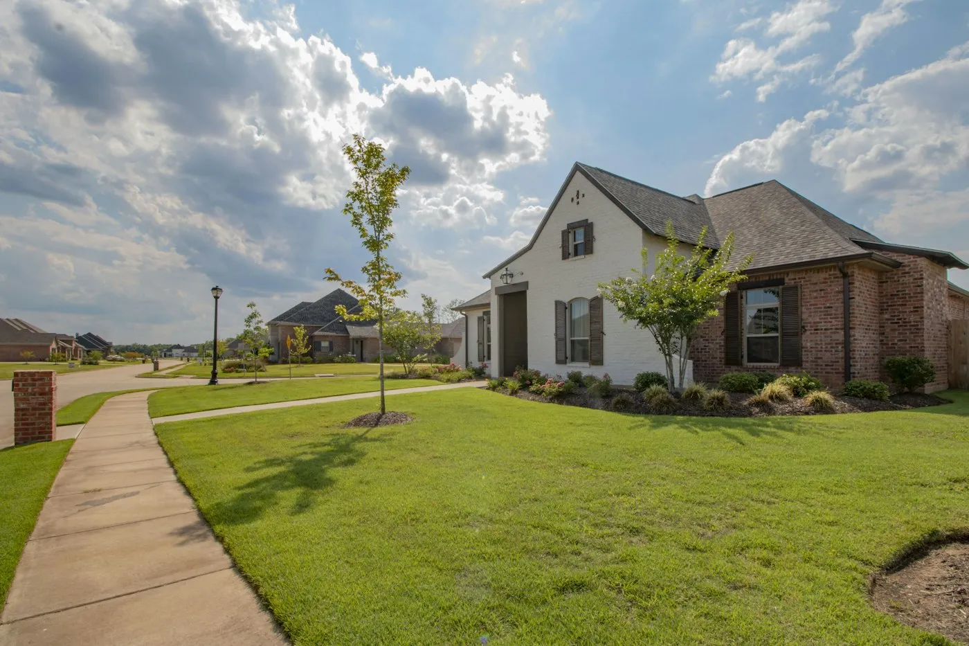 Two-story suburban Kentucky home with a front lawn